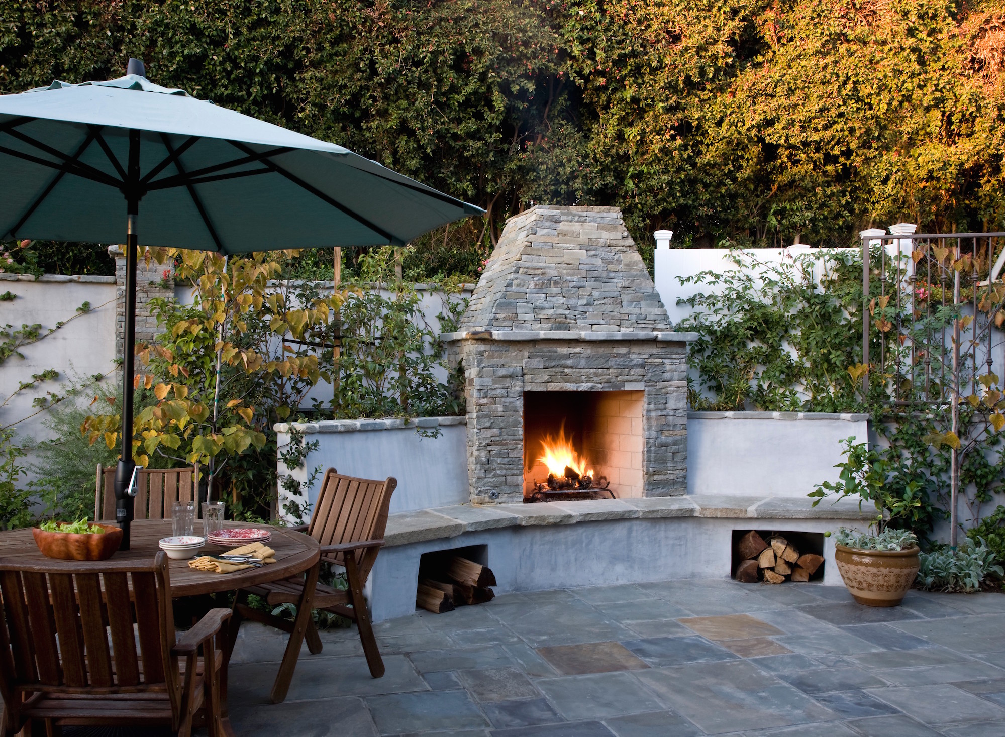 15 Fire Pit Ideas To Keep You Cozy Year Round