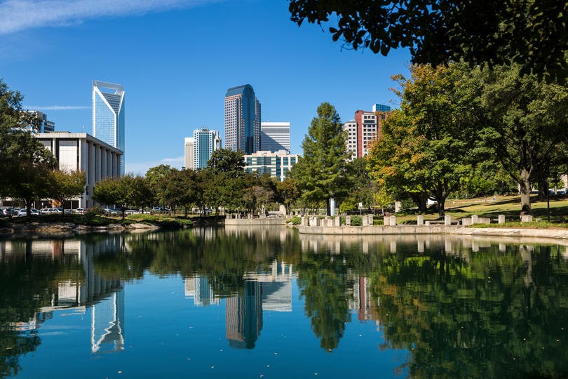 Charlotte skyline reflected in water, NC, USA