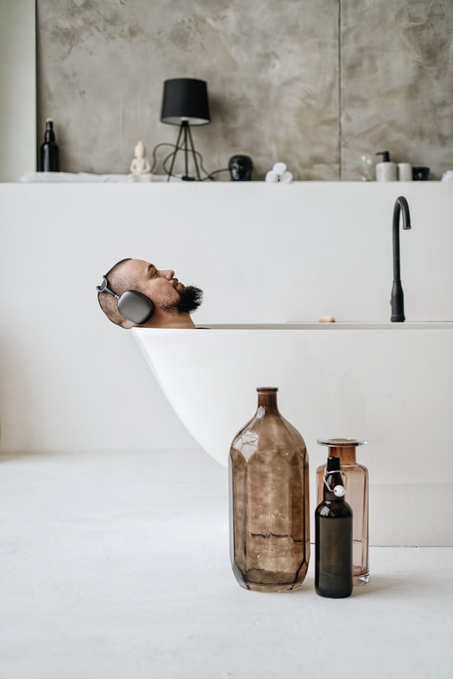 Man Relaxing using bath therapy
