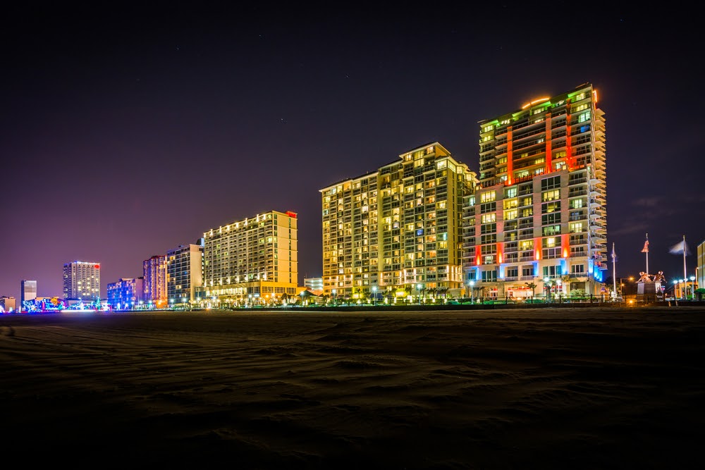 Highrise hotels on the oceanfront at night, in Virginia Beach, Virginia.
