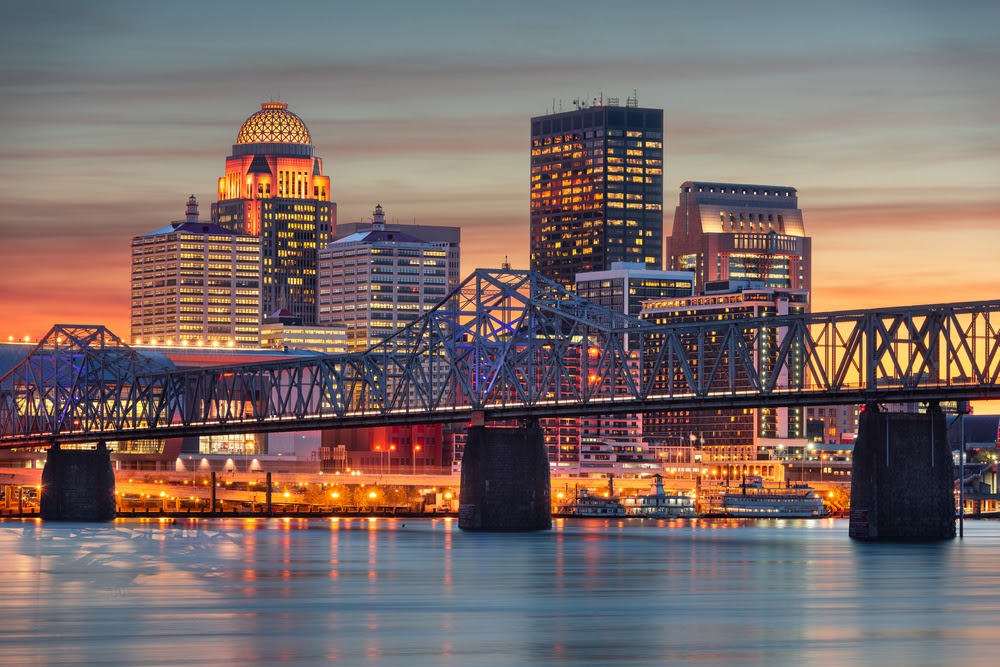 Louisville, Kentucky, USA skyline on the river at dusk