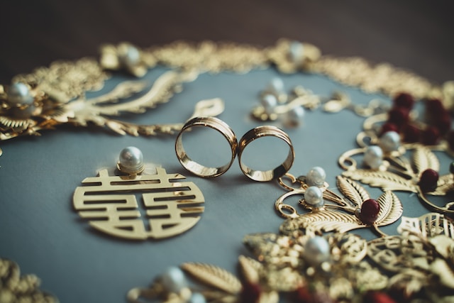 golden rings, necklaces, and earrings 